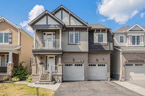 Photo 1 at 212 Rivertree Street, Emerald Meadows/Trailwest, Kanata