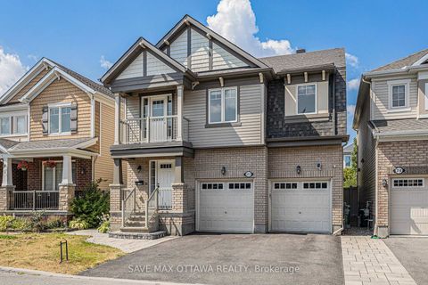 Photo 2 at 212 Rivertree Street, Emerald Meadows/Trailwest, Kanata