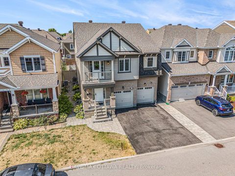 Photo 3 at 212 Rivertree Street, Emerald Meadows/Trailwest, Kanata