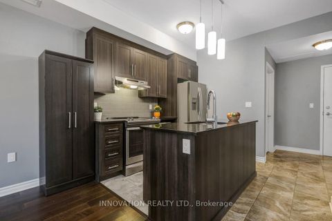 Photo 6 at 116 - 120 Prestige Circle, Chatelaine Village, Orleans