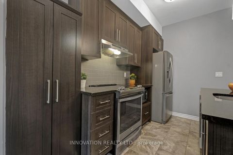 Photo 7 at 116 - 120 Prestige Circle, Chatelaine Village, Orleans