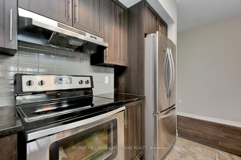 Photo 8 at 114 - 120 Prestige Circle, Chatelaine Village, Orleans
