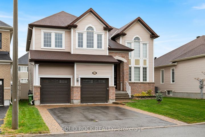 Photo 1 at 347 Bamburgh Way, Nepean (Cedargrove/Fraserdale), Ottawa