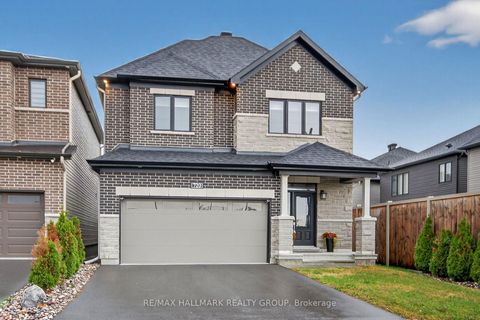 Photo 1 at 720 Cappamore Drive, Nepean (Half Moon Bay), Ottawa