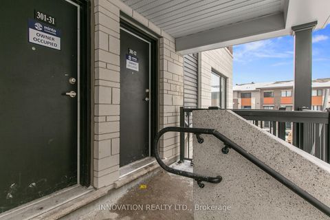 Photo 1 at 32 - 301 GLENROY GILBERT Drive, Nepean (Strandherd), Ottawa