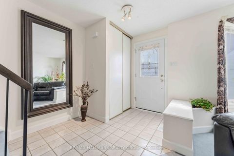 Photo 2 at 32 - 941 Cookshire Crescent, Fallingbrook/Ridgemount, Orleans