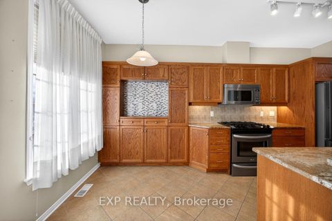 Photo 11 at 215 Cairnsmore Circle, Nepean (Stonebridge), Ottawa