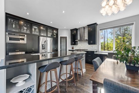 Photo 13 at 133 Arbourbrook Boulevard, Huntley Ward (South East), Carp