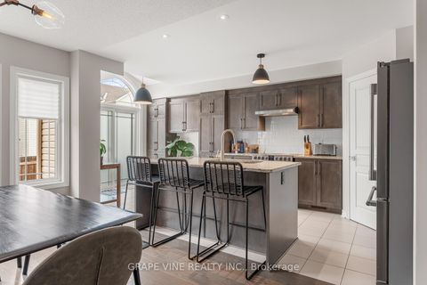 Photo 10 at 568 Voie Du Pin Rouge Way, Mer Bleue/Bradley Estates/Anderson Park, Orleans