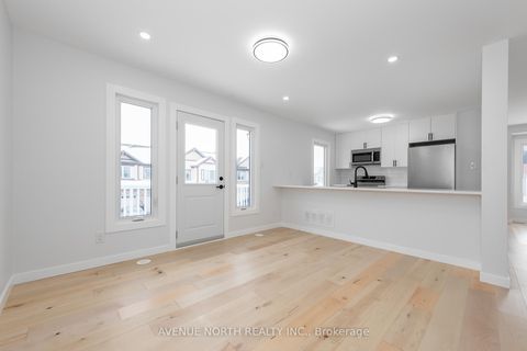 Photo 9 at 10 Streambank Street, Emerald Meadows/Trailwest, Kanata