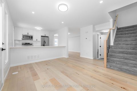 Photo 11 at 10 Streambank Street, Emerald Meadows/Trailwest, Kanata