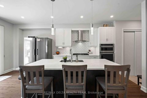 Photo 11 at 58 HACKAMORE Crescent, Goulbourn Twp From Franktown Rd/South To Rideau, Stittsville