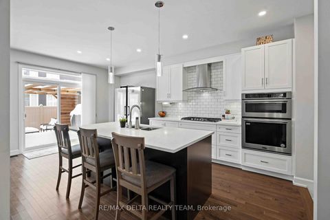 Photo 17 at 58 HACKAMORE Crescent, Goulbourn Twp From Franktown Rd/South To Rideau, Stittsville