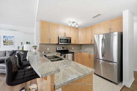 Photo 2 at 4 - 50 Prestige Circle, Chatelaine Village, Orleans