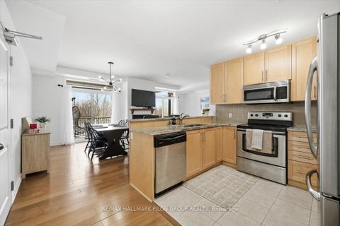 Photo 4 at 4 - 50 Prestige Circle, Chatelaine Village, Orleans