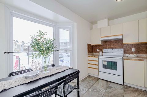 Photo 2 at 8 - 104 Mcdermot Court, Katimavik, Kanata