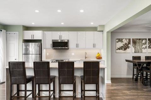 Photo 8 at 566 Meadowcreek Circle, Emerald Meadows/Trailwest, Kanata