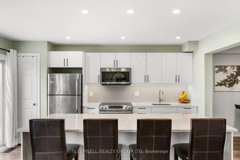 Photo 9 at 566 Meadowcreek Circle, Emerald Meadows/Trailwest, Kanata