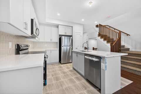 Photo 11 at 887 Eileen Vollick Crescent, Morgan's Grant/South March, Kanata