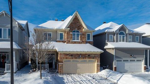 Photo 1 at 211 Asper Trail Circle, Emerald Meadows/Trailwest, Kanata