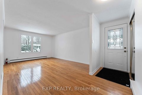 Photo 2 at 303 Amiens Street, Bilberry Creek/Queenswood Heights, Orleans