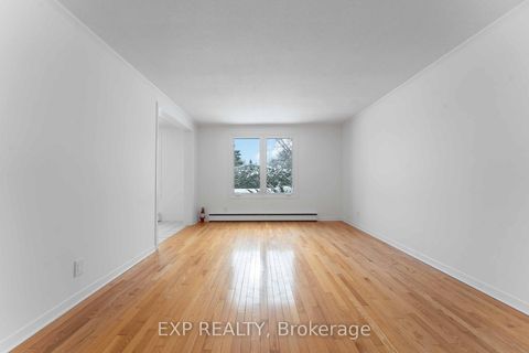 Photo 3 at 303 Amiens Street, Bilberry Creek/Queenswood Heights, Orleans