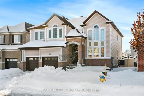 Photo 1 at 347 Bamburgh Way, Nepean (Cedargrove/Fraserdale), Ottawa