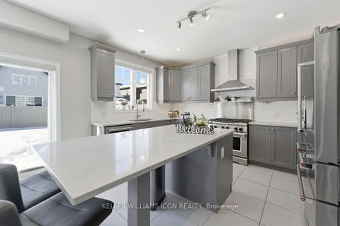 Photo 11 at 307 Nonius Street, Emerald Meadows/Trailwest, Kanata