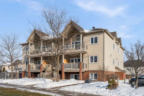Photo 1 at 10 - 165 Waterbridge Drive, Nepean (Barrhaven East), Ottawa
