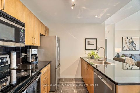 Photo 10 at 10 - 165 Waterbridge Drive, Nepean (Barrhaven East), Ottawa