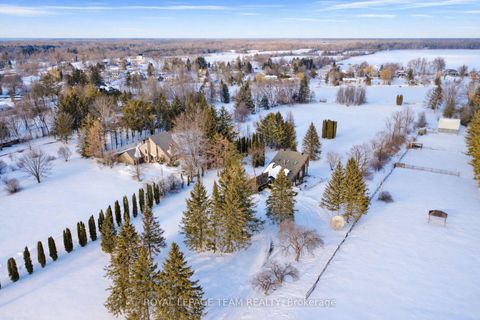 Photo 1 at 5965 Rideau Valley Drive N, Manotick South to Roger Stevens, Manotick