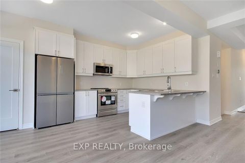 Photo 6 at 305 Cornflower Row, Goulbourn Twp From Franktown Rd/South To Rideau, Stittsville