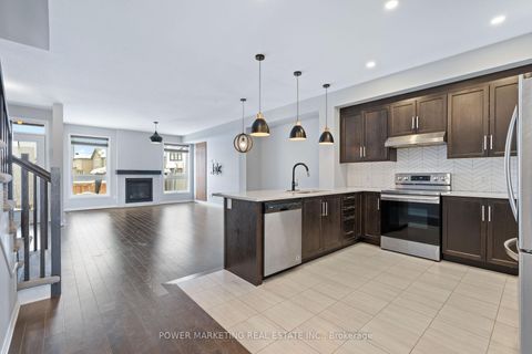 Photo 5 at 497 Cope Drive, Emerald Meadows/Trailwest, Kanata