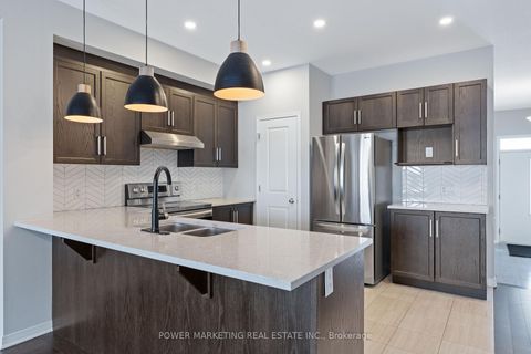 Photo 7 at 497 Cope Drive, Emerald Meadows/Trailwest, Kanata