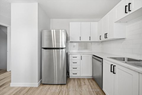 Photo 4 at 5 - 228 Millroad Way, Chatelaine Village, Orleans