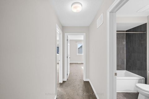 Photo 11 at 783 Brittanic Road, Emerald Meadows/Trailwest, Kanata