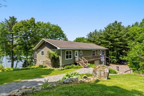 Photo 1 at 32 Forest Breeze Lane, Rideau Lakes (South Crosby) Twp, Rideau Lakes