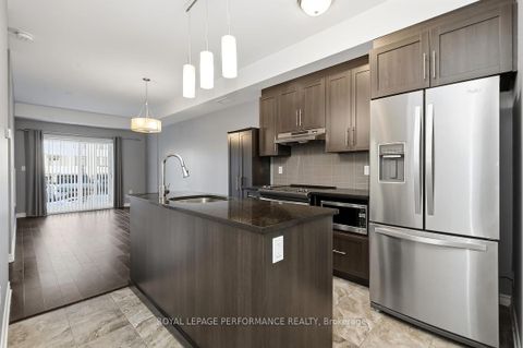 Photo 7 at 116 - 120 Prestige Circle, Chatelaine Village, Orleans