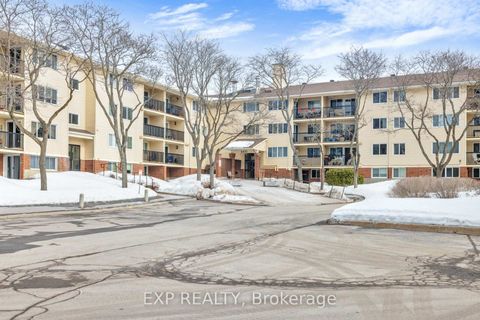 Photo 1 at 104 - 6470 BILBERRY Drive, Orleans Wood, Orleans