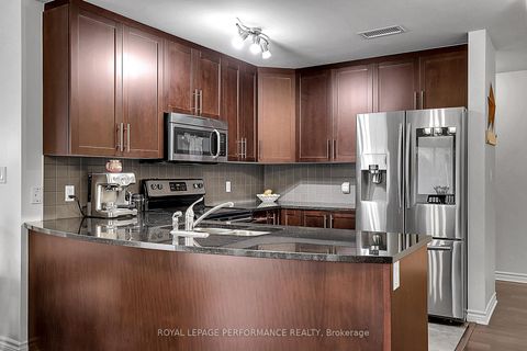 Photo 6 at 2 - 40 Prestige Circle, Chatelaine Village, Orleans