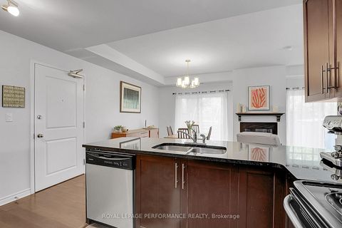 Photo 7 at 2 - 40 Prestige Circle, Chatelaine Village, Orleans