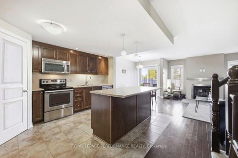 Photo 2 at 511 Voie Du Pin Rouge Way, Mer Bleue/Bradley Estates/Anderson Park, Orleans