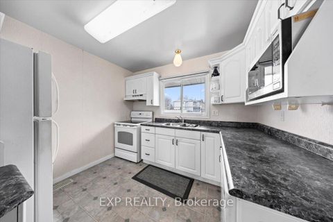 Photo 6 at 915 Lawnsberry Drive, Chatelaine Village, Orleans