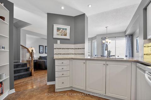 Photo 8 at 114 Tandalee Crescent, Emerald Meadows/Trailwest, Kanata