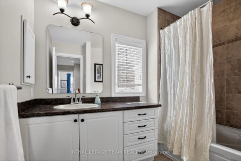 Photo 20 at 114 Tandalee Crescent, Emerald Meadows/Trailwest, Kanata