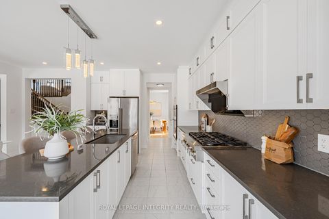 Photo 11 at 1027 PARABOLICA Way, Kanata Lakes/Heritage Hills, Kanata