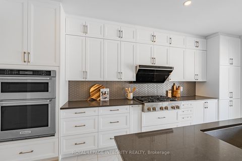 Photo 12 at 1027 PARABOLICA Way, Kanata Lakes/Heritage Hills, Kanata