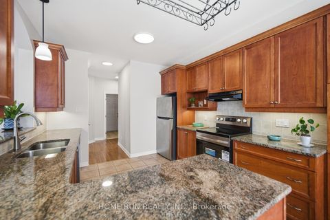 Photo 15 at 141 Steeple Chase Drive, Bridlewood, Kanata