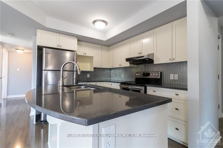 Photo 5 at 8 - 565 Stonefield Private, Nepean (Barrhaven East), Ottawa