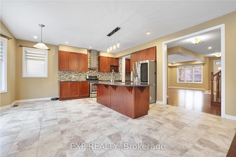 Photo 8 at 210 Rivertree Street, Emerald Meadows/Trailwest, Kanata